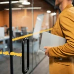A man in a yellow jacket holds a silver laptop beside a glass office door, through which a blurred modern office interior is visible. Glacier_Glass_Regina Glacier_Glass_Regina Glacier_Glass_Regina Glacier_Glass_Regina Glacier_Glass_Regina Glacier_Glass_Regina Glacier_Glass_Regina Glacier_Glass_Regina Glacier_Glass_Regina Glacier_Glass_Regina Glacier_Glass_Regina Glacier_Glass_Regina Glacier_Glass_Regina Glacier_Glass_Regina Glacier_Glass_Regina Glacier_Glass_Regina Glacier_Glass_Regina Glacier_Glass_Regina Glacier_Glass_Regina Glacier_Glass_Regina Glacier_Glass_Regina Glacier_Glass_Regina Glacier_Glass_Regina Glacier_Glass_Regina Glacier_Glass_Regina Glacier_Glass_Regina Glacier_Glass_Regina Glacier_Glass_Regina Glacier_Glass_Regina Glacier_Glass_Regina Glacier_Glass_Regina Glacier_Glass_Regina Glacier_Glass_Regina Glacier_Glass_Regina Glacier_Glass_Regina Glacier_Glass_Regina Glacier_Glass_Regina Glacier_Glass_Regina Glacier_Glass_Regina