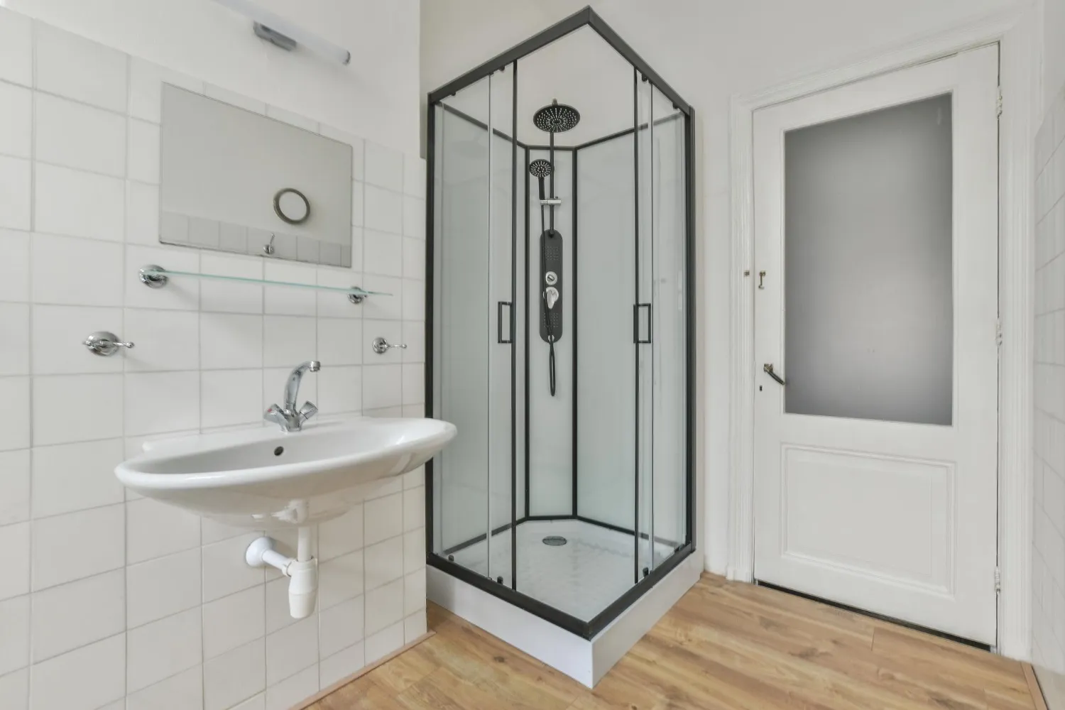 glass shower enclosure with half wall