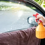 A hand sprays liquid from an orange bottle onto a car window, leaving white foam and streaks on the glass, while a brown towel is draped over the car door. Glacier_Glass_Regina Glacier_Glass_Regina Glacier_Glass_Regina Glacier_Glass_Regina Glacier_Glass_Regina Glacier_Glass_Regina Glacier_Glass_Regina Glacier_Glass_Regina Glacier_Glass_Regina Glacier_Glass_Regina Glacier_Glass_Regina Glacier_Glass_Regina Glacier_Glass_Regina Glacier_Glass_Regina Glacier_Glass_Regina Glacier_Glass_Regina Glacier_Glass_Regina Glacier_Glass_Regina Glacier_Glass_Regina Glacier_Glass_Regina Glacier_Glass_Regina Glacier_Glass_Regina Glacier_Glass_Regina Glacier_Glass_Regina Glacier_Glass_Regina Glacier_Glass_Regina Glacier_Glass_Regina Glacier_Glass_Regina Glacier_Glass_Regina Glacier_Glass_Regina Glacier_Glass_Regina Glacier_Glass_Regina Glacier_Glass_Regina Glacier_Glass_Regina Glacier_Glass_Regina Glacier_Glass_Regina Glacier_Glass_Regina Glacier_Glass_Regina Glacier_Glass_Regina Glacier_Glass_Regina Glacier_Glass_Regina Glacier_Glass_Regina Glacier_Glass_Regina Glacier_Glass_Regina Glacier_Glass_Regina Glacier_Glass_Regina Glacier_Glass_Regina Glacier_Glass_Regina Glacier_Glass_Regina Glacier_Glass_Regina Glacier_Glass_Regina Glacier_Glass_Regina Glacier_Glass_Regina